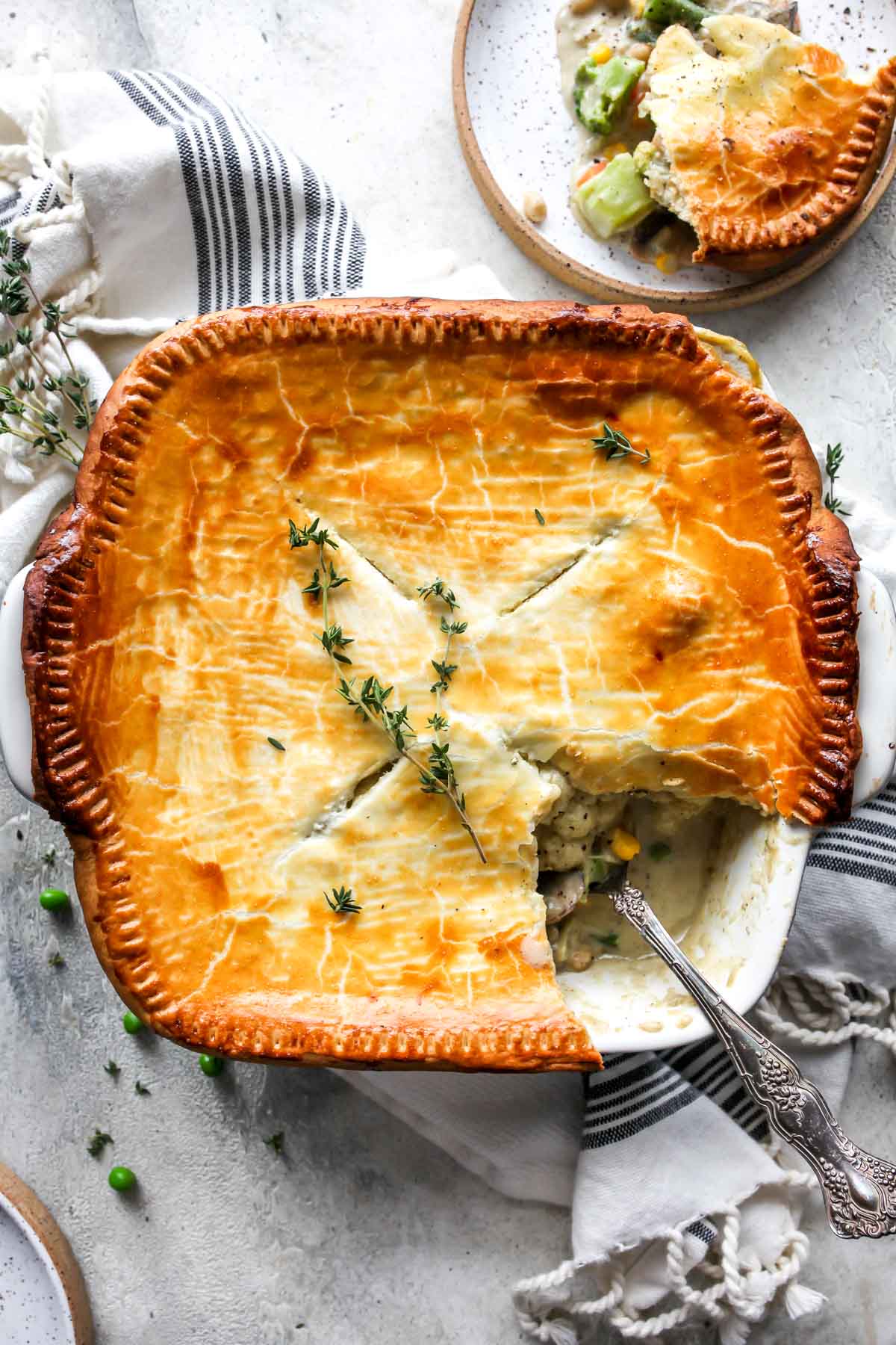 Serving spoon showing portion of vegetable pot pie