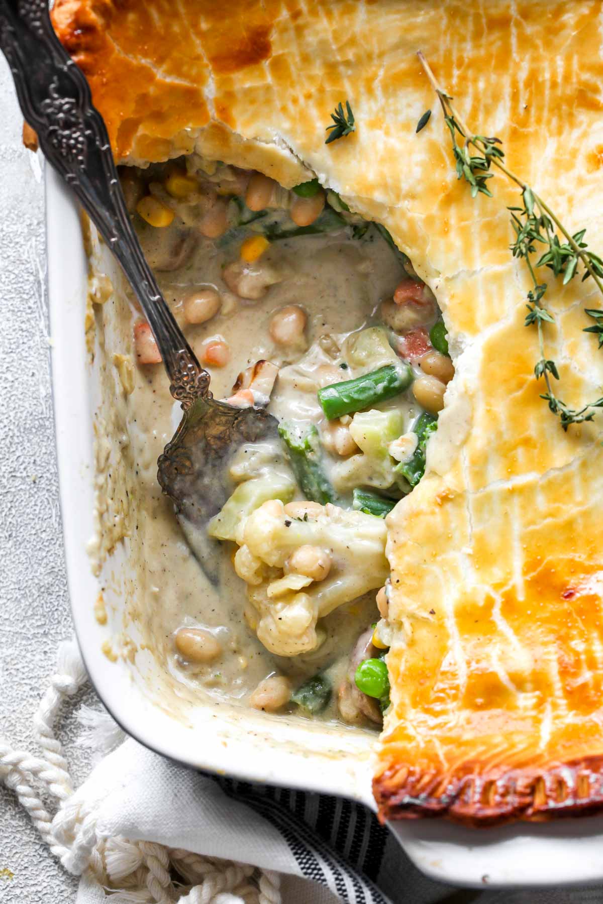 Pot pie with a scoop removed to show filling