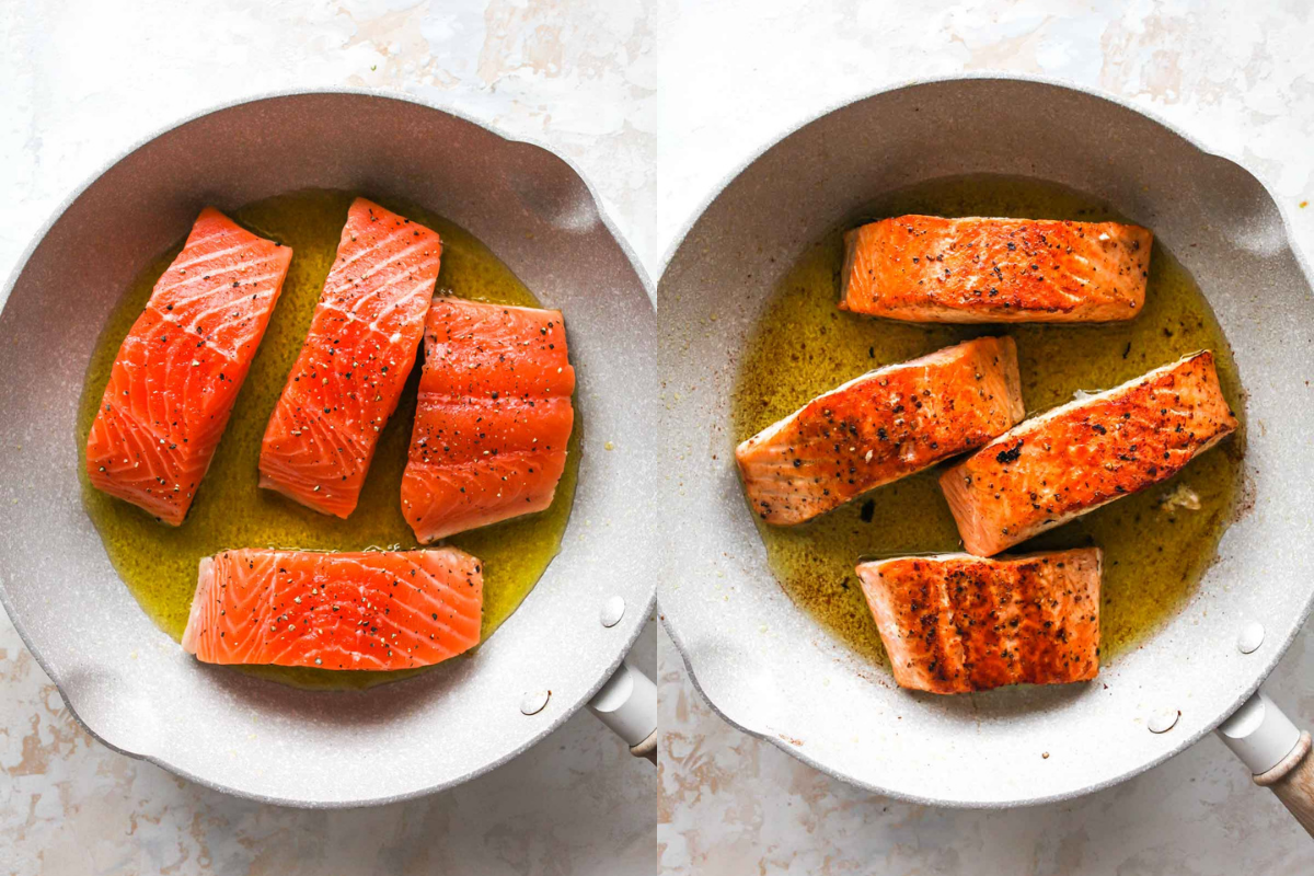 Salmon fillets being cooked in a skillet on the flesh and skin side