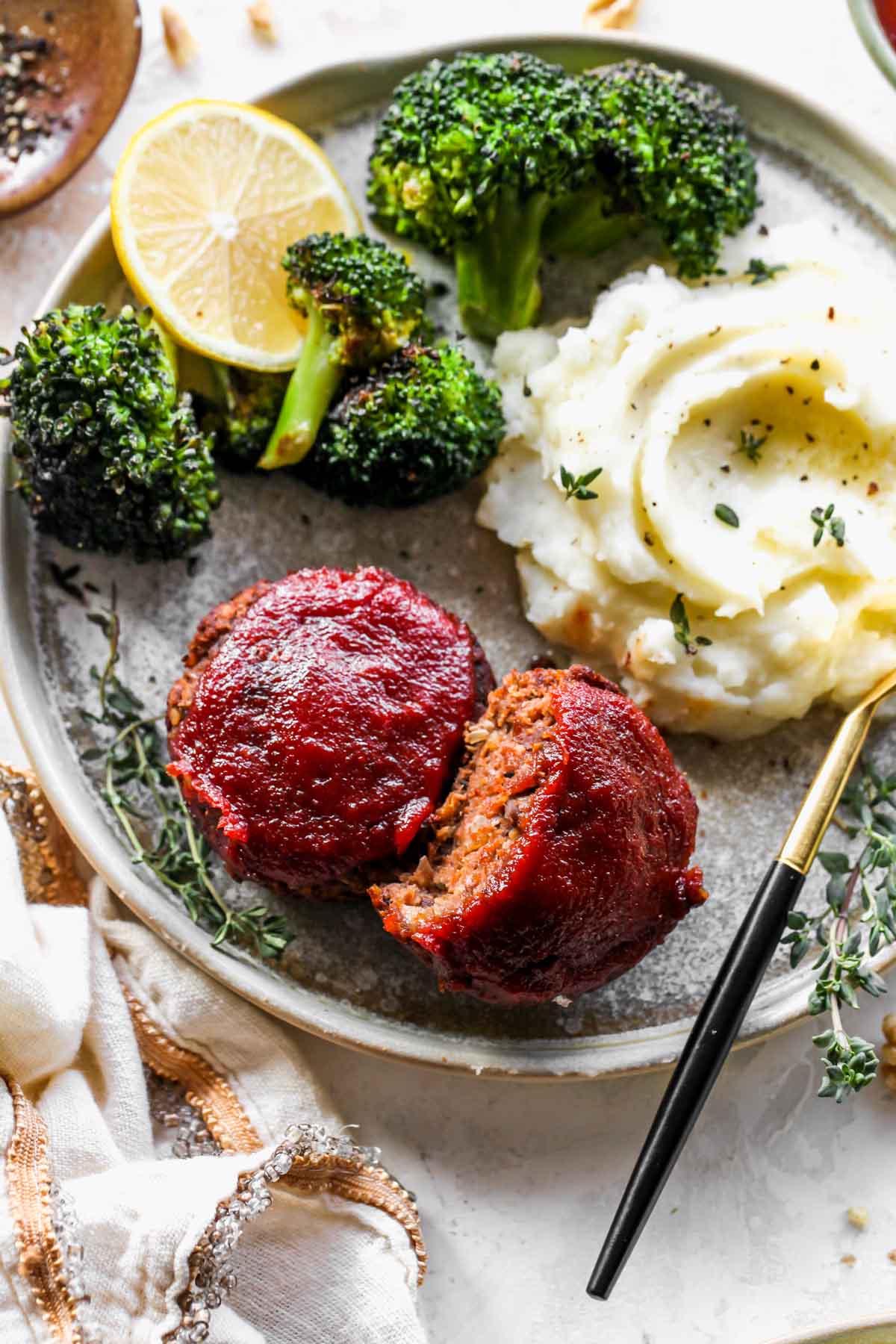 Vegetarian BBQ Meatloaf Minis on a plate with veggies