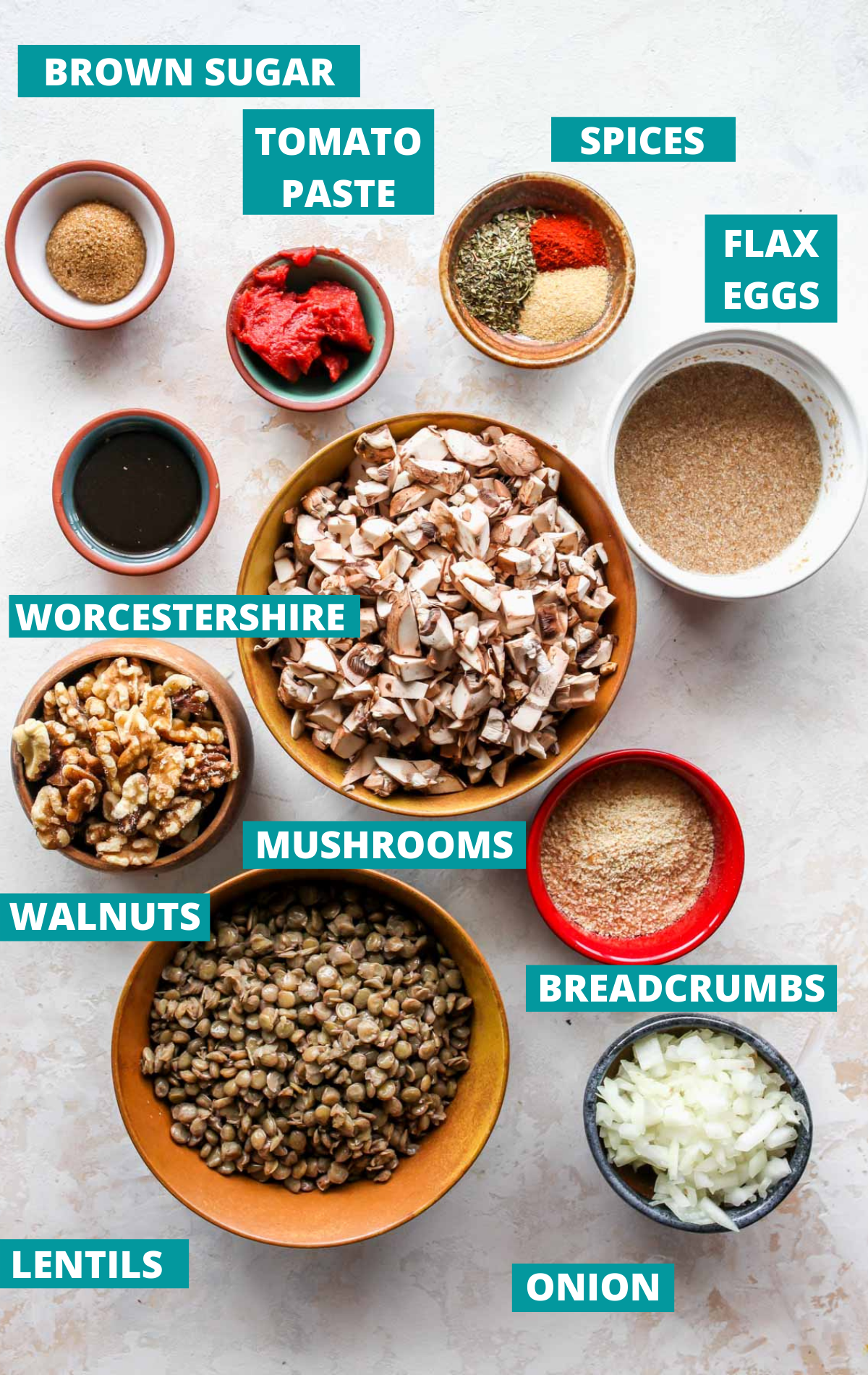 Recipe ingredients in separate bowls with blue labels
