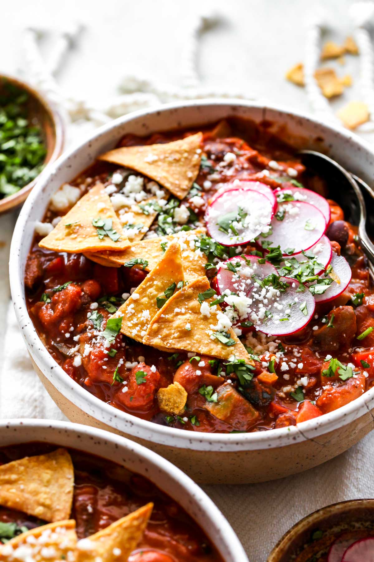 Side view of mole chili showing toppings