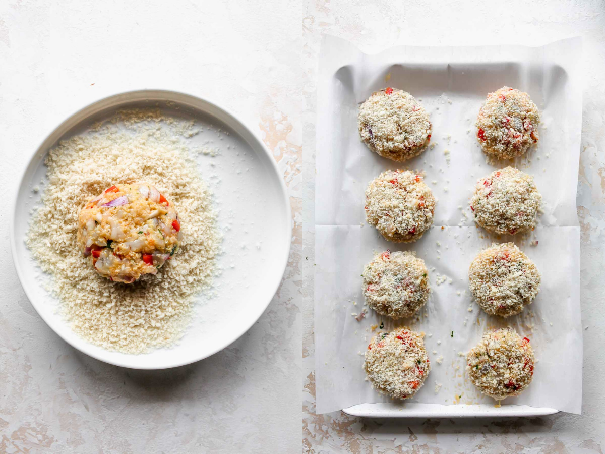 Raw shrimp patties being coated in breadcrumbs and placed on a baking sheet