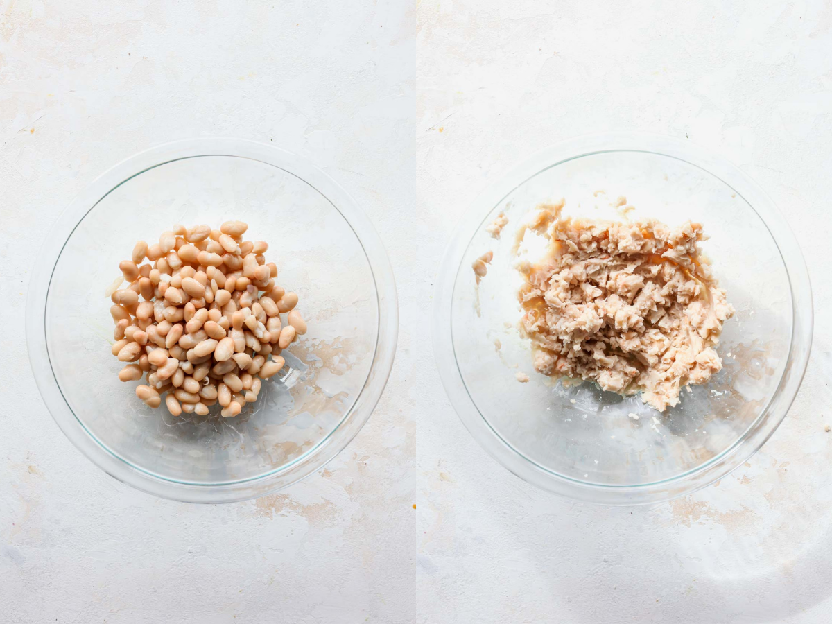 Cannellini beans being mashed in a clear bowl