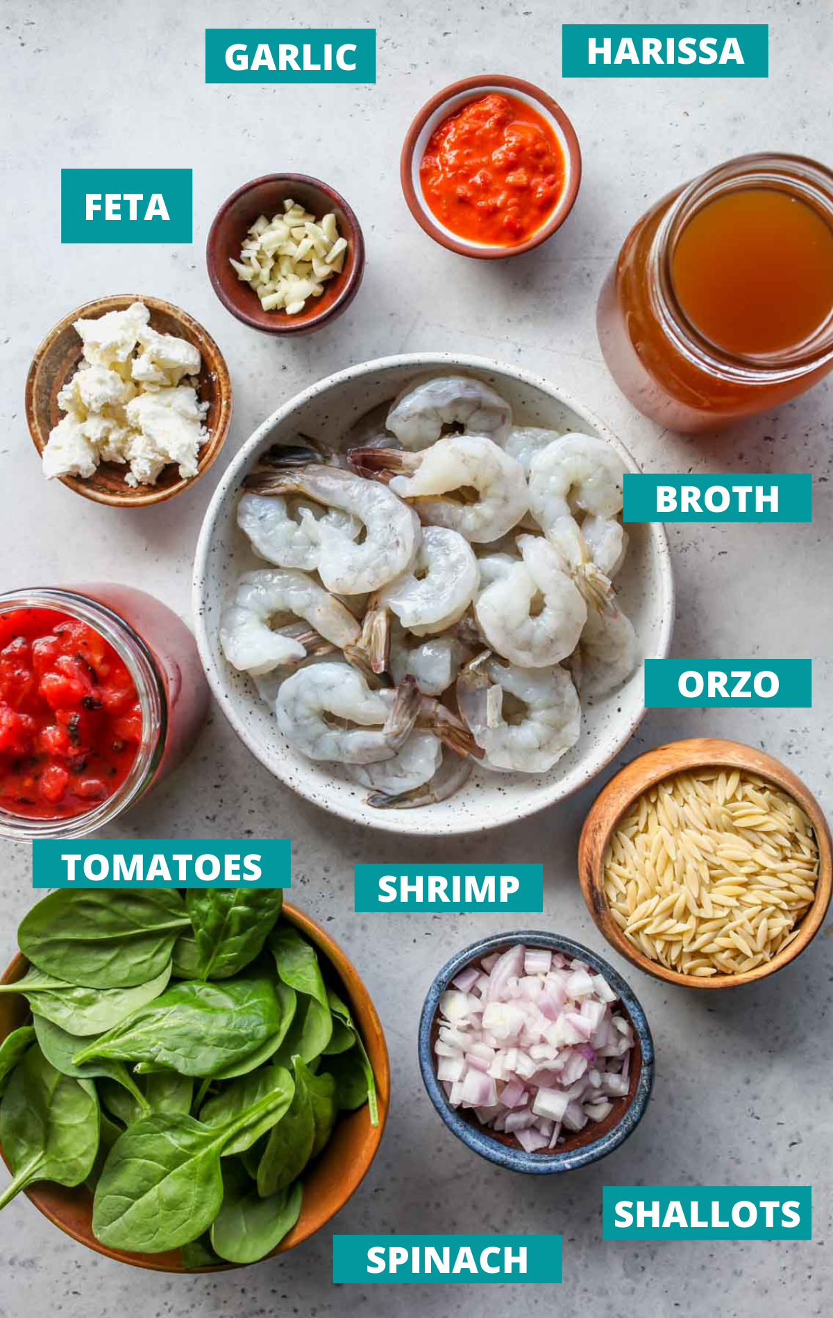 Recipe ingredients laid out on a board with blue labels