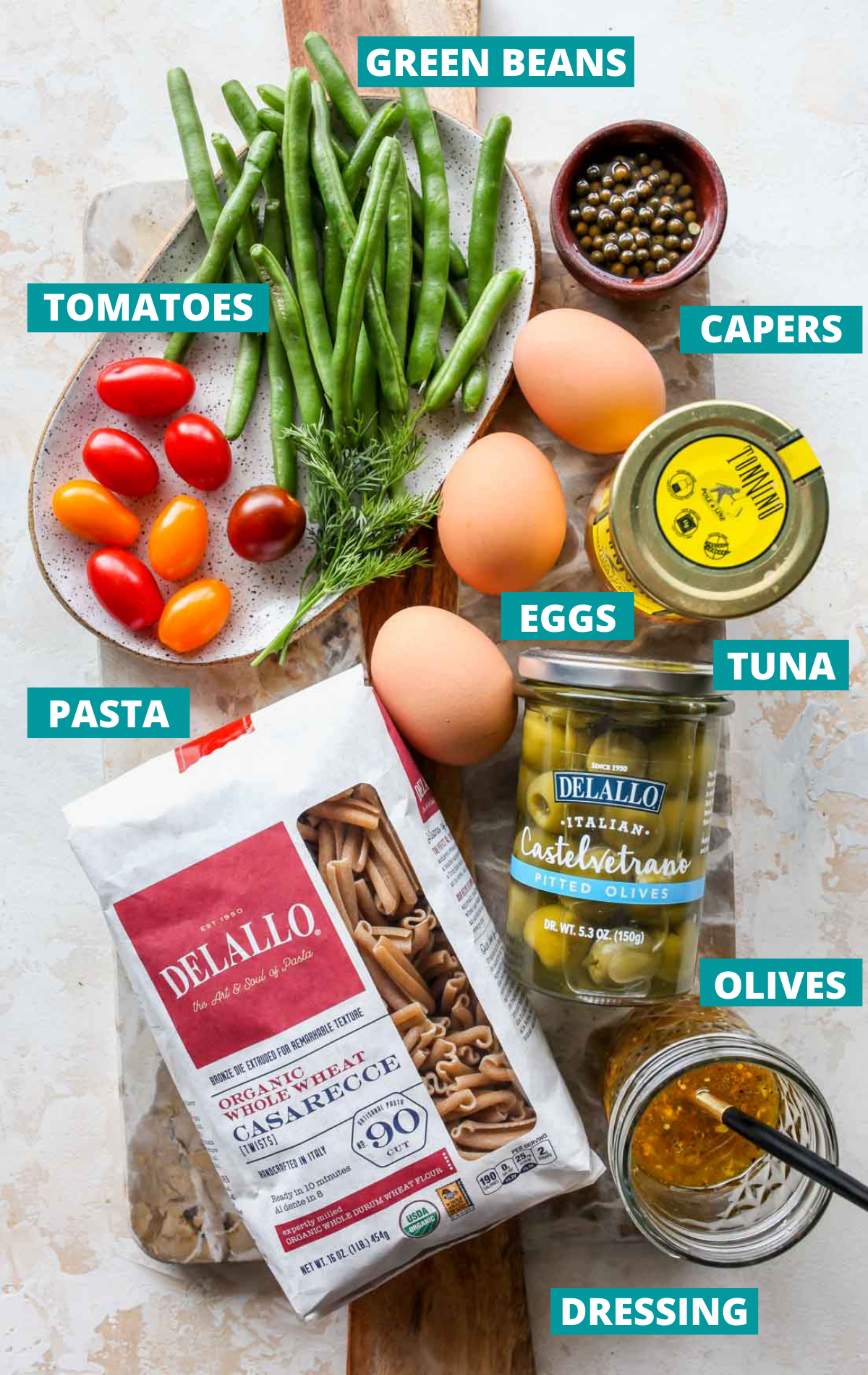 Recipe ingredients laid out on a board with blue labels