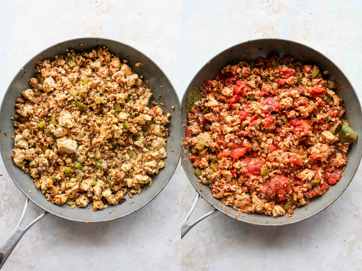 Tofu and tomatoes being added to a skillet over peppers and onions