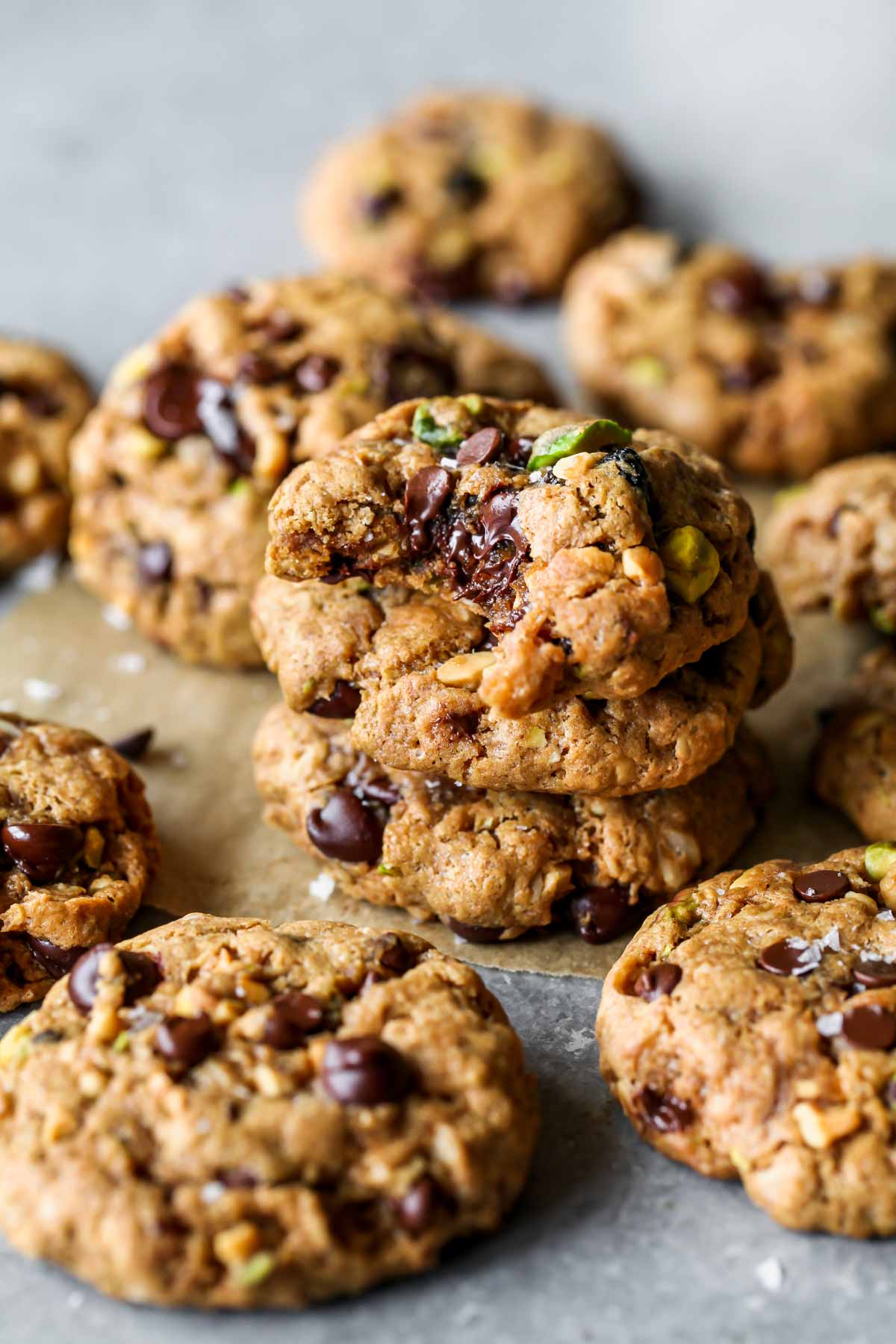 Trail Mix Cookies stacked on top of each other with a bite taken out