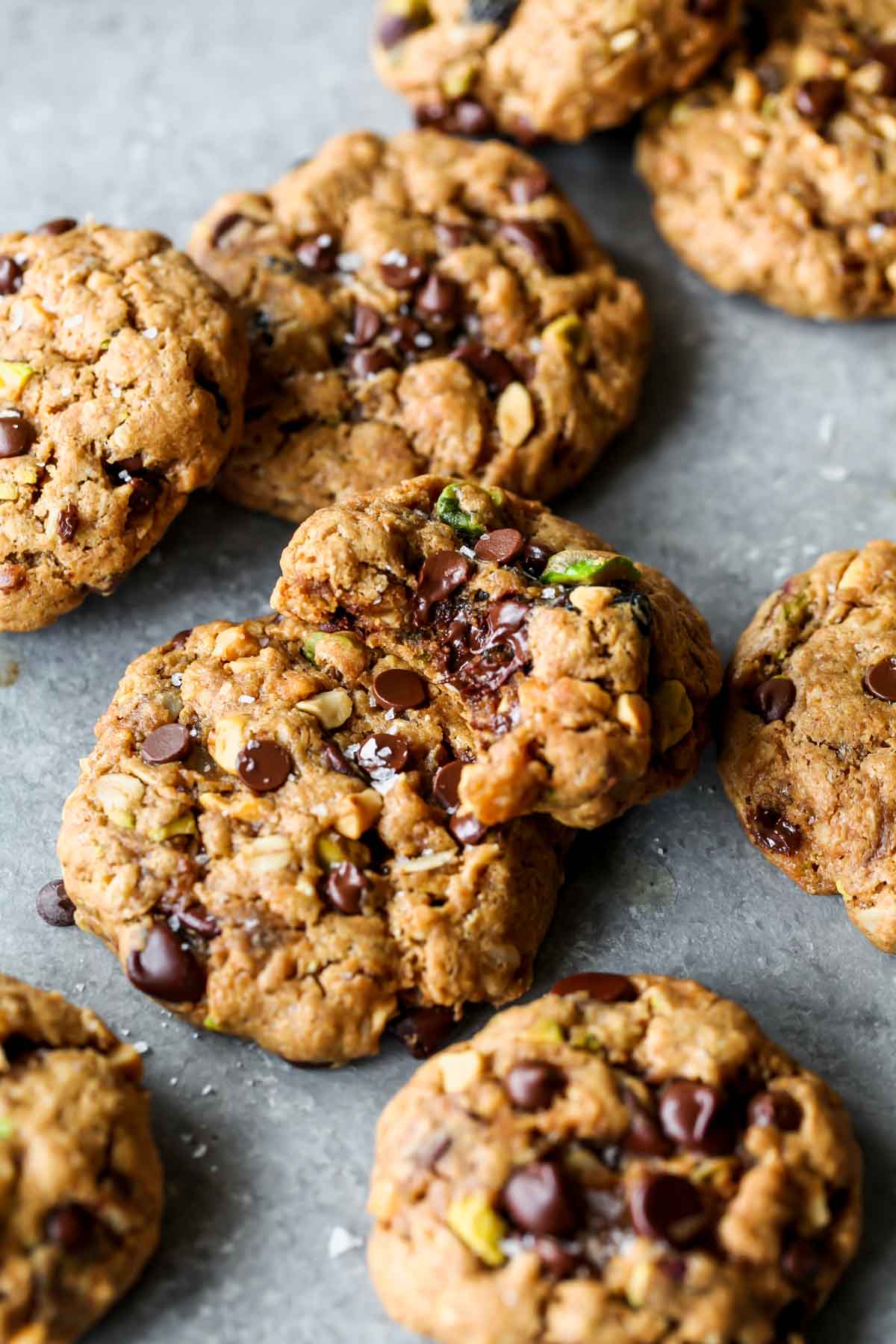 Trail Mix Cookies arranged on a grey surface