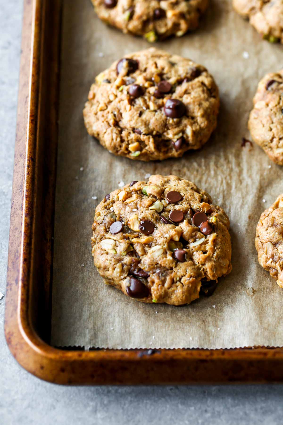 A baking sheet lined with baked cookies