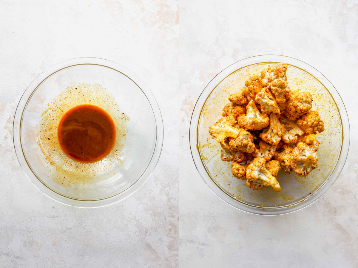 Olive oil, spices, and cauliflower florets being tossed together in a bowl