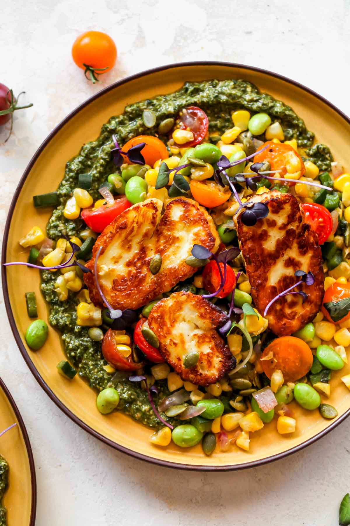 Succotash assembled on a yellow plate