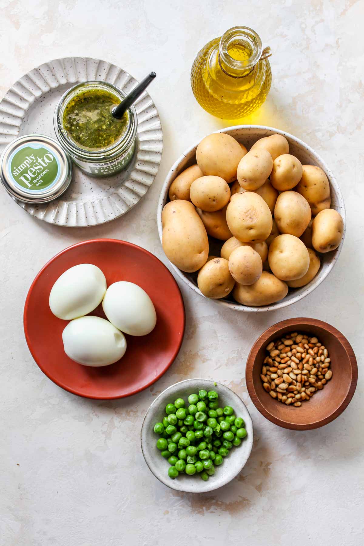 Recipe ingredients in separate bowls on a white board