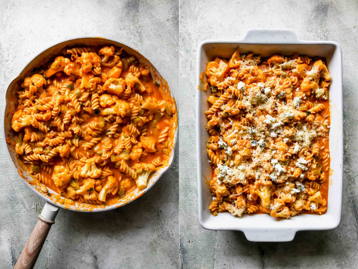 Cooked pasta being stirred in a skillet with buffalo sauce