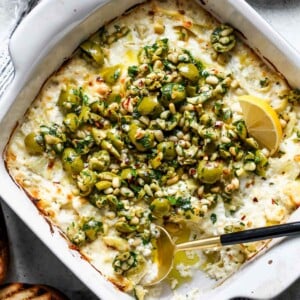 Baked Feta and Artichoke Dip with Olive Gremolata