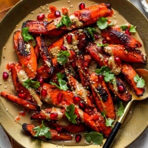 Harissa Roasted Carrots with Maple-Lime Tahini Sauce