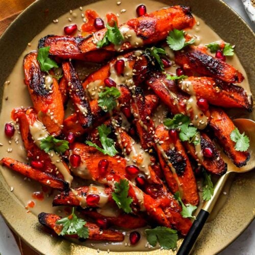 Harissa Roasted Carrots with Maple-Lime Tahini Sauce