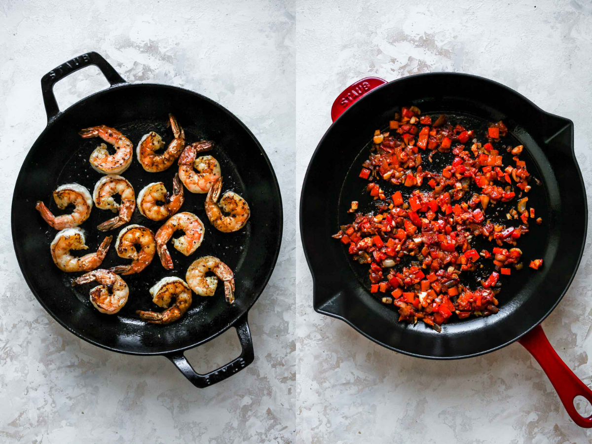 Seared shrimp and sauteed aromatics in a black skillet