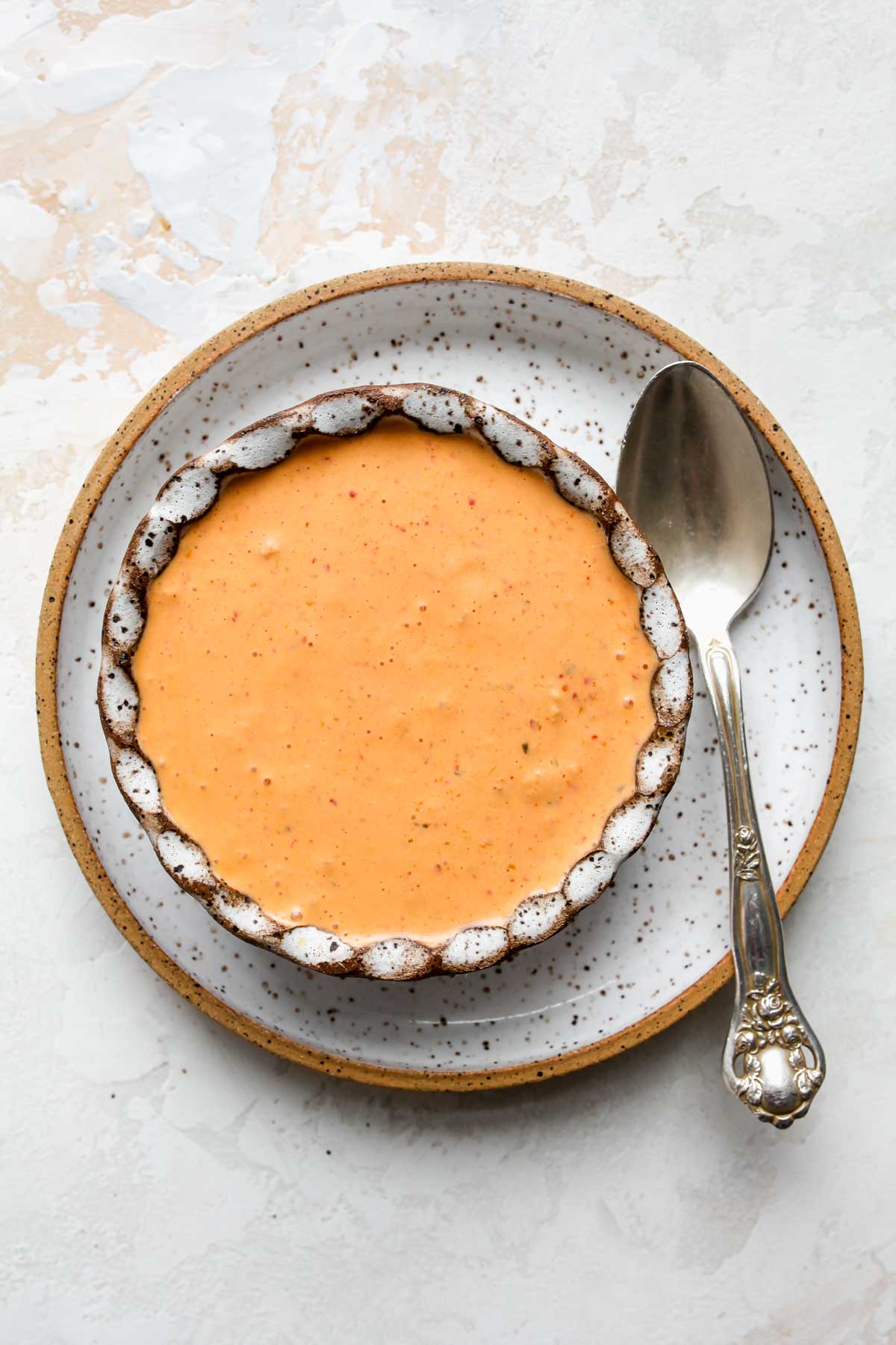 Kimchi cream in a white bowl