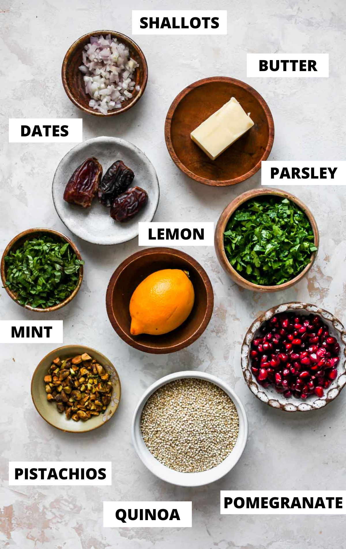 Recipe ingredients in separate bowls with title labels