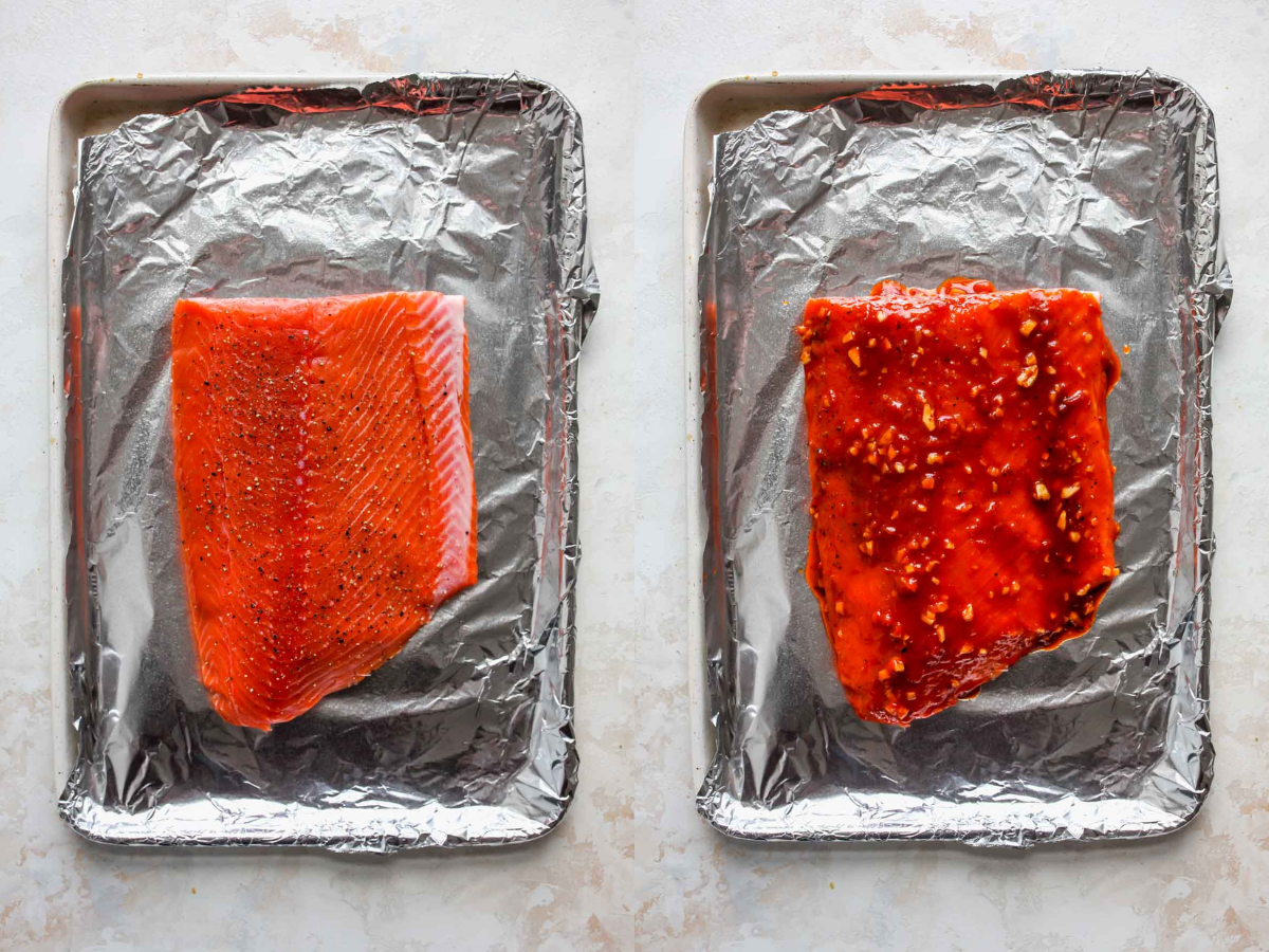 Salmon fillet coated in honey-harissa sauce on a foil-lined baking sheet