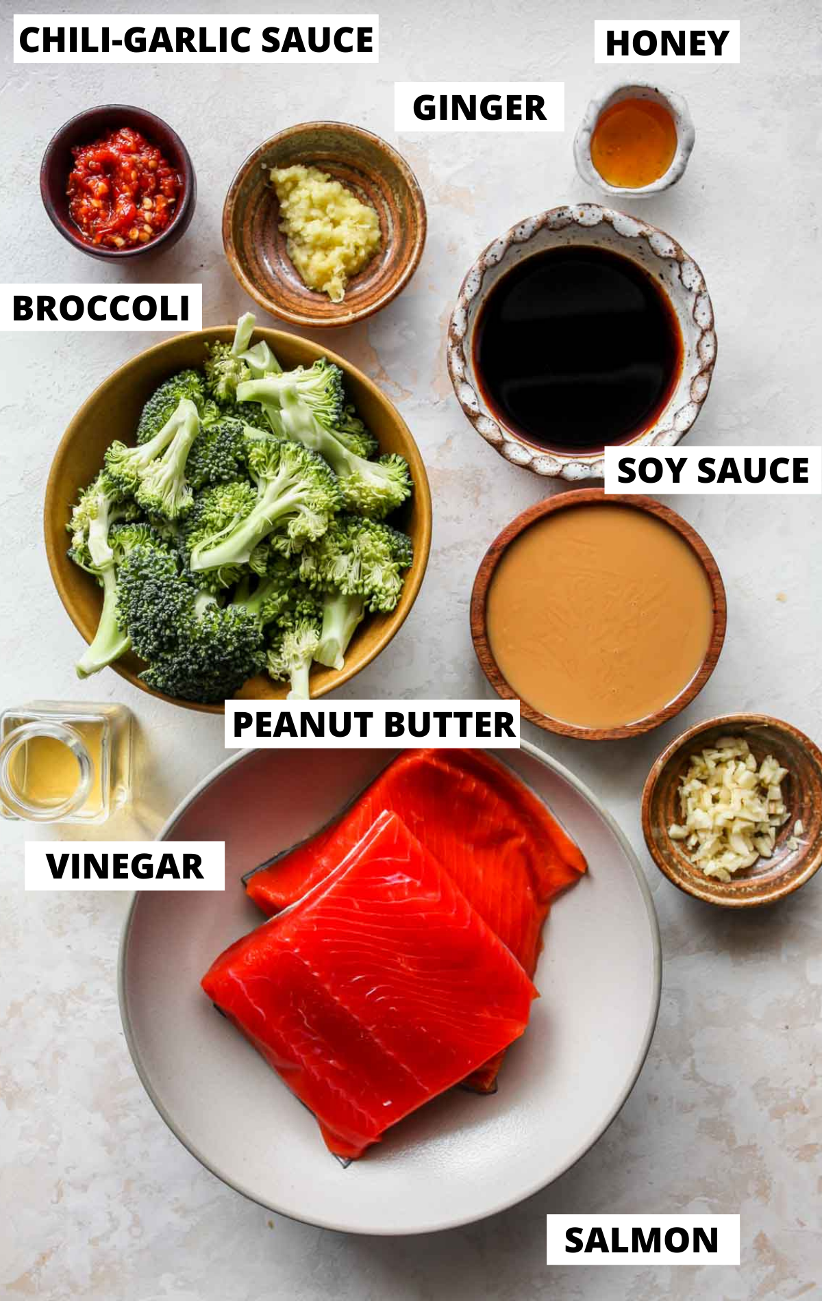 Recipe ingredients in separate bowls with labels.