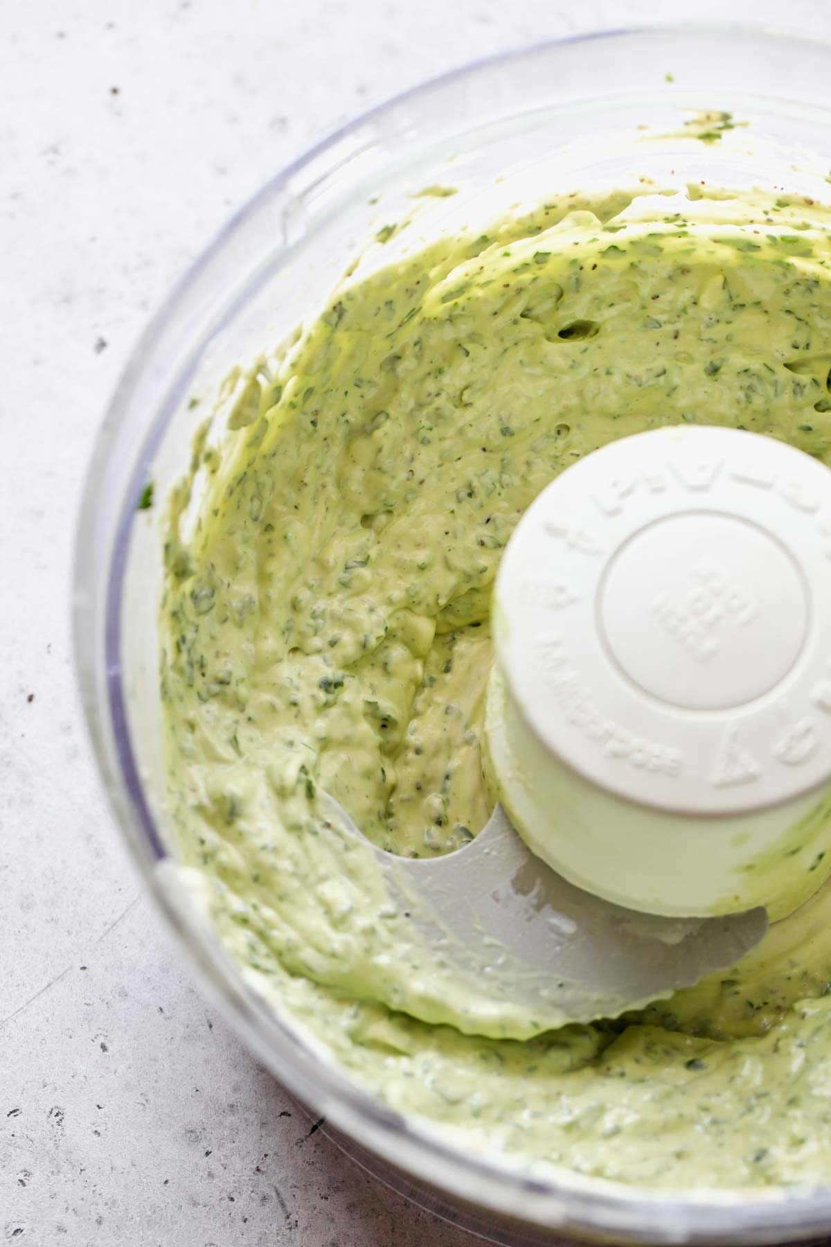Avocado dip blended in a food processor