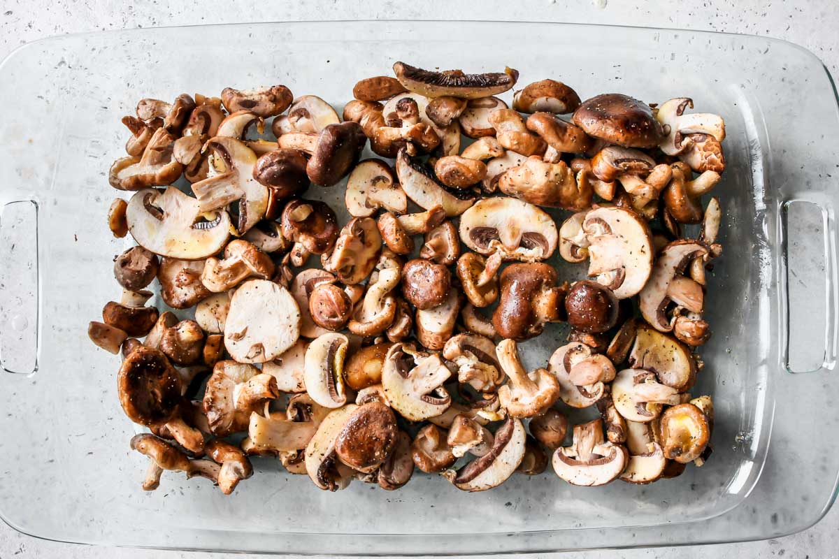 Shiitake and cremini mushrooms in a baking dish