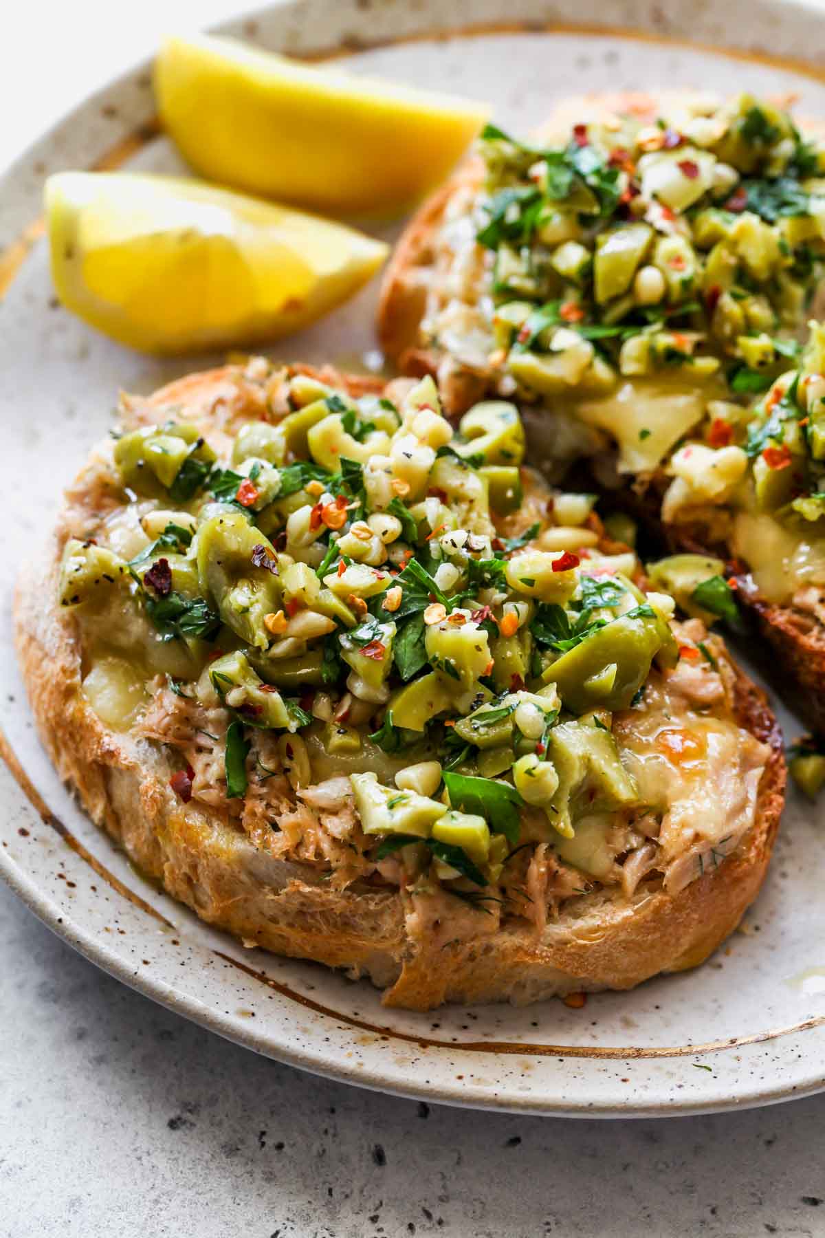 Tuna melt topped with olive salsa