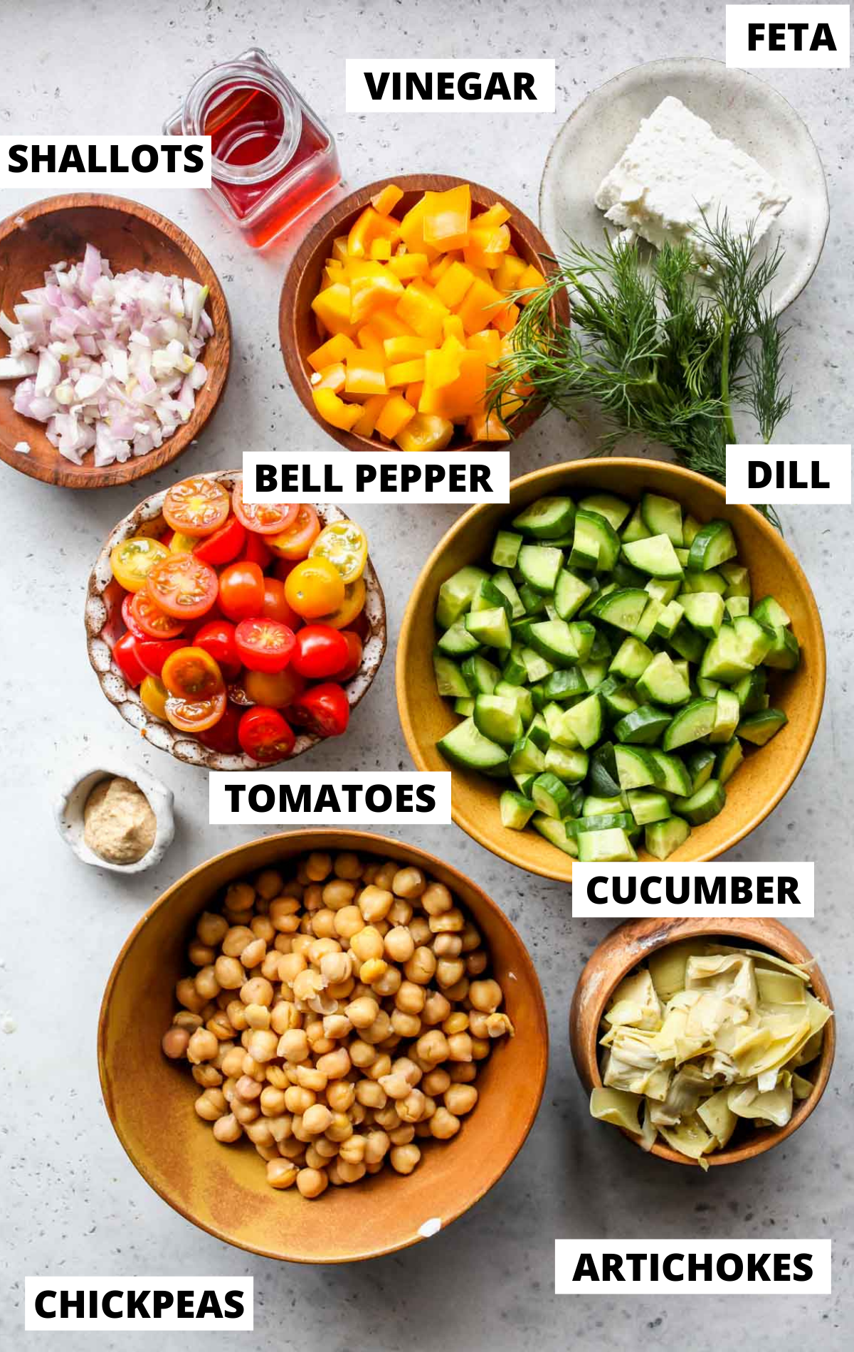 Recipe ingredients in separate bowls with labels