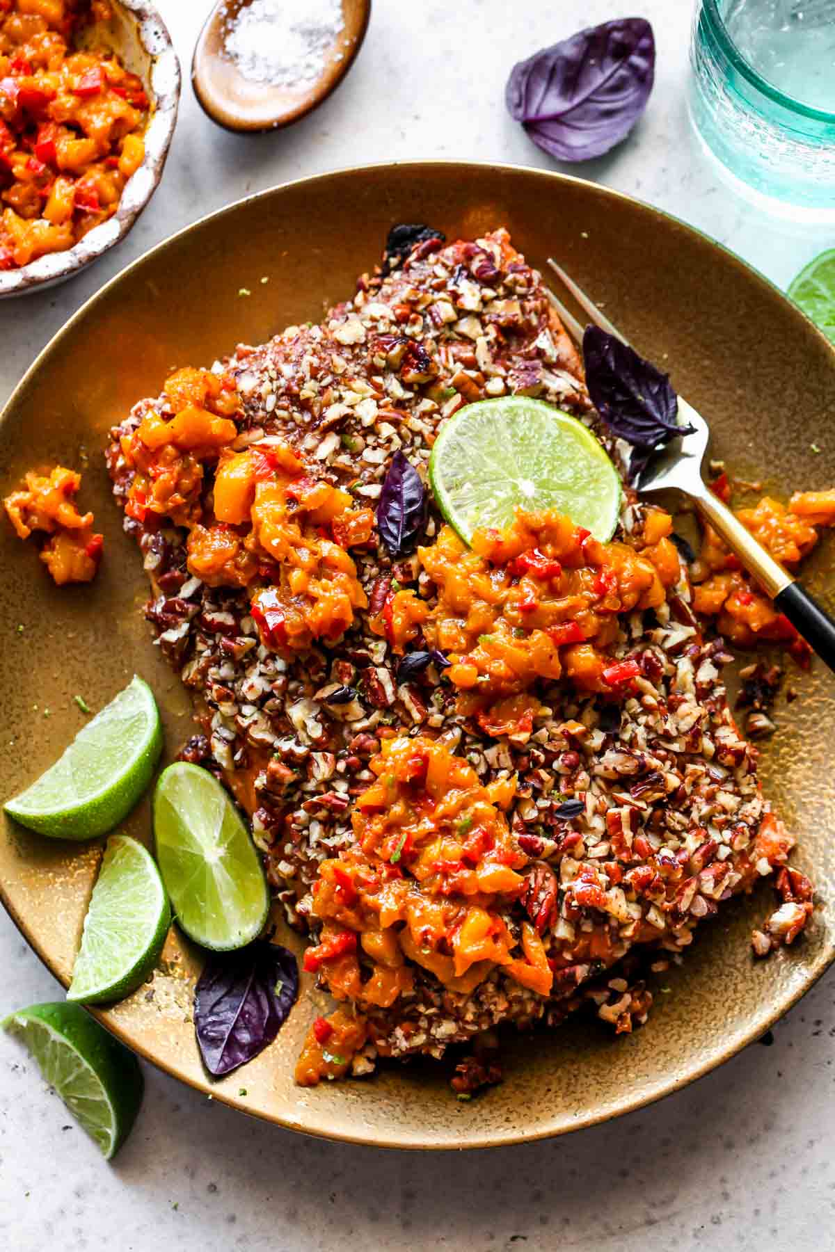 Pecan-Crusted Salmon with Mango Chutney on a gold platter