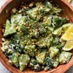 Smashed Cucumber Salad with Feta-Dill Dressing and Pistachios.