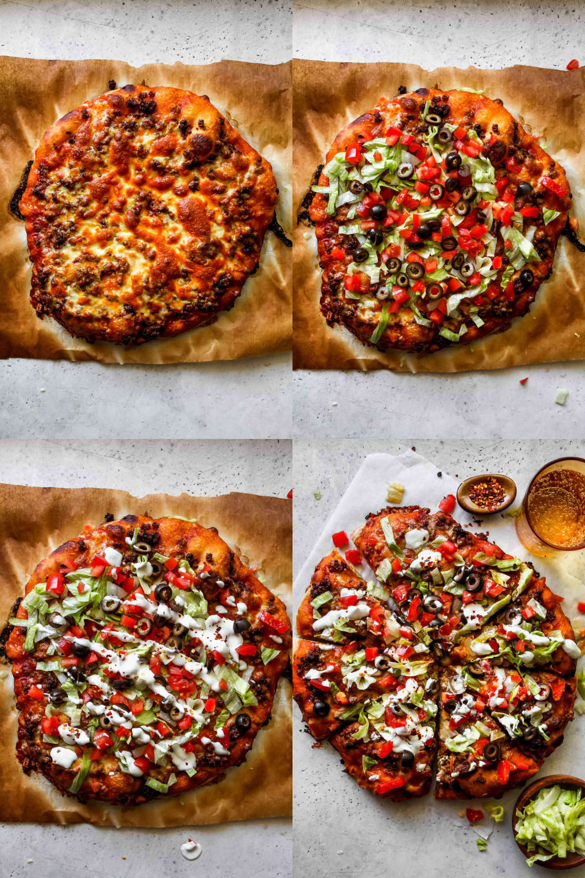 Baked pizza topped with lettuce, tomatoes, olives, and sour cream drizzle