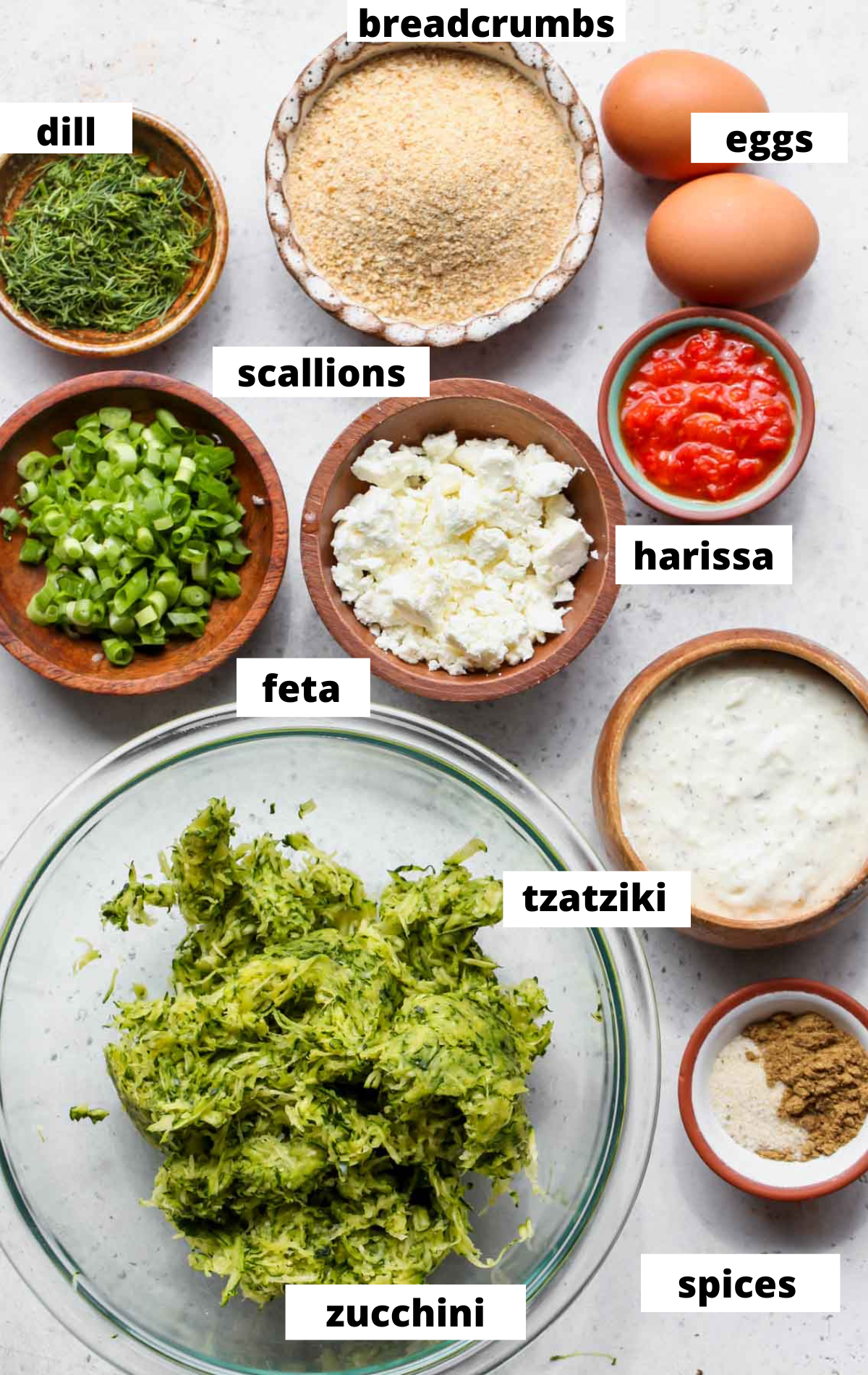 Recipe ingredients in separate bowls with labels