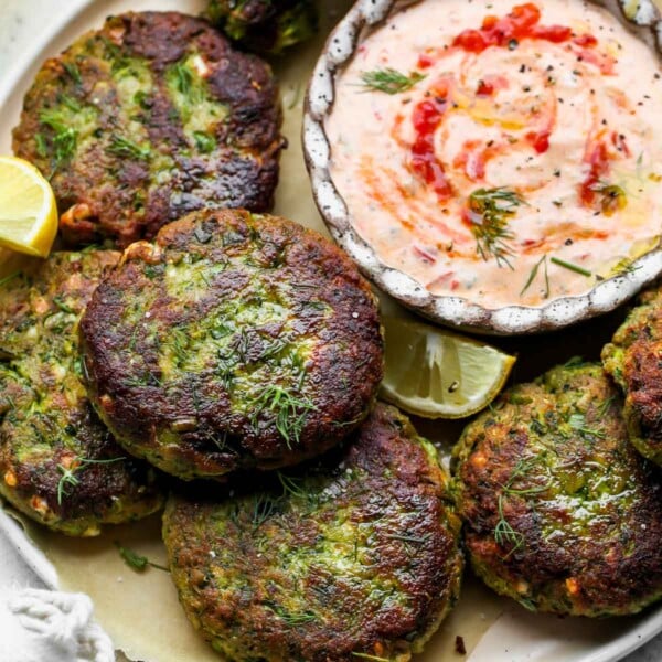 Zucchini-Feta Cakes with Harissa Tzatziki