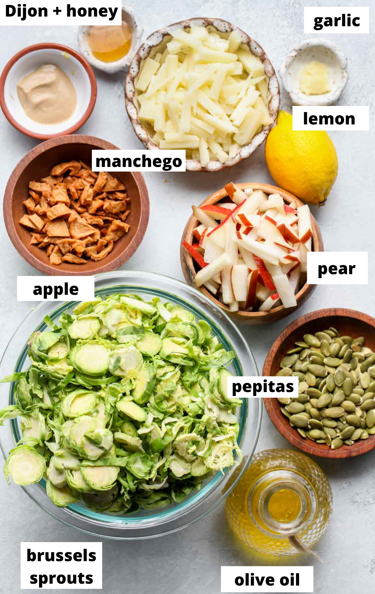 Recipe ingredients in separate bowls with text labels