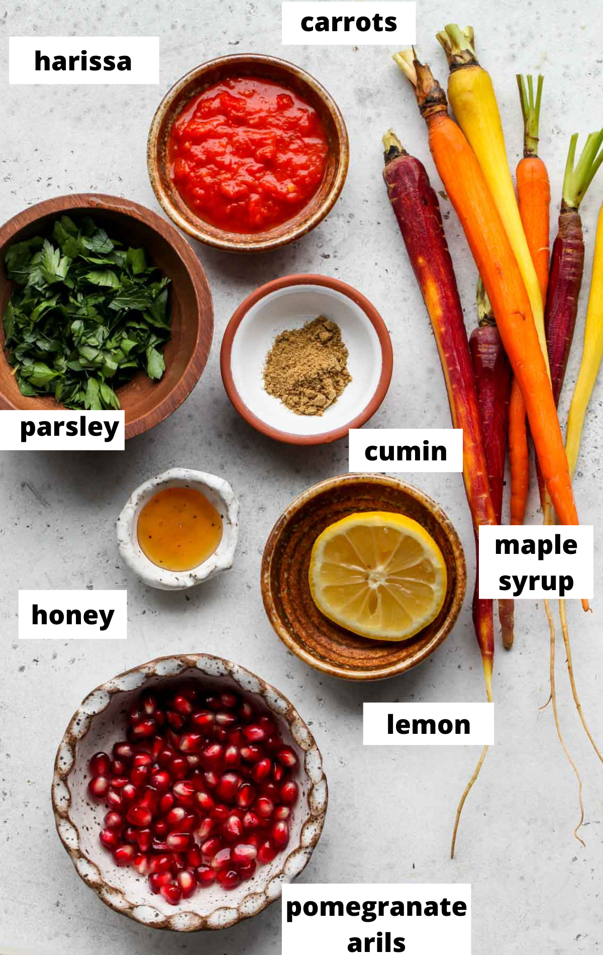 Recipe ingredients in separate bowls with labels.