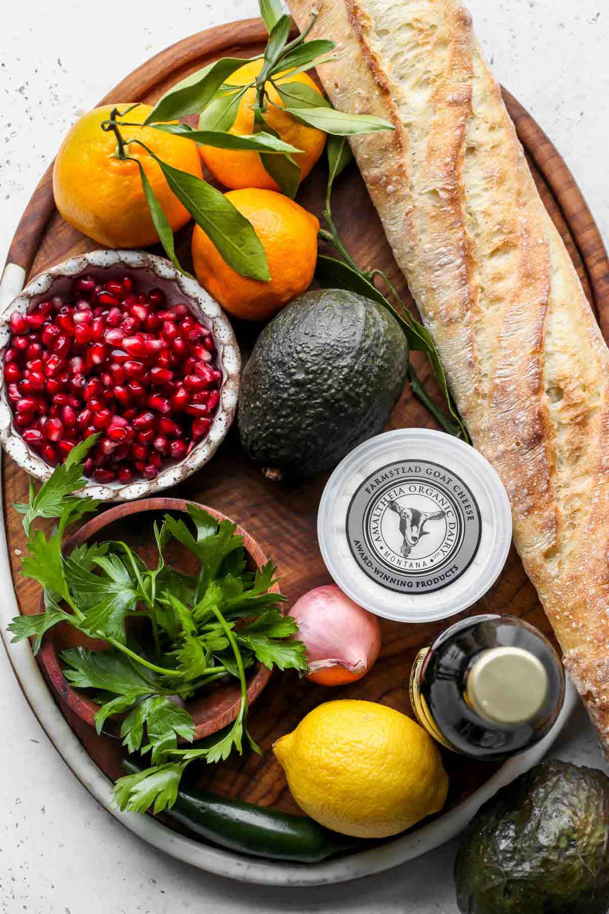 Recipe ingredients arranged on a wooden serving platter