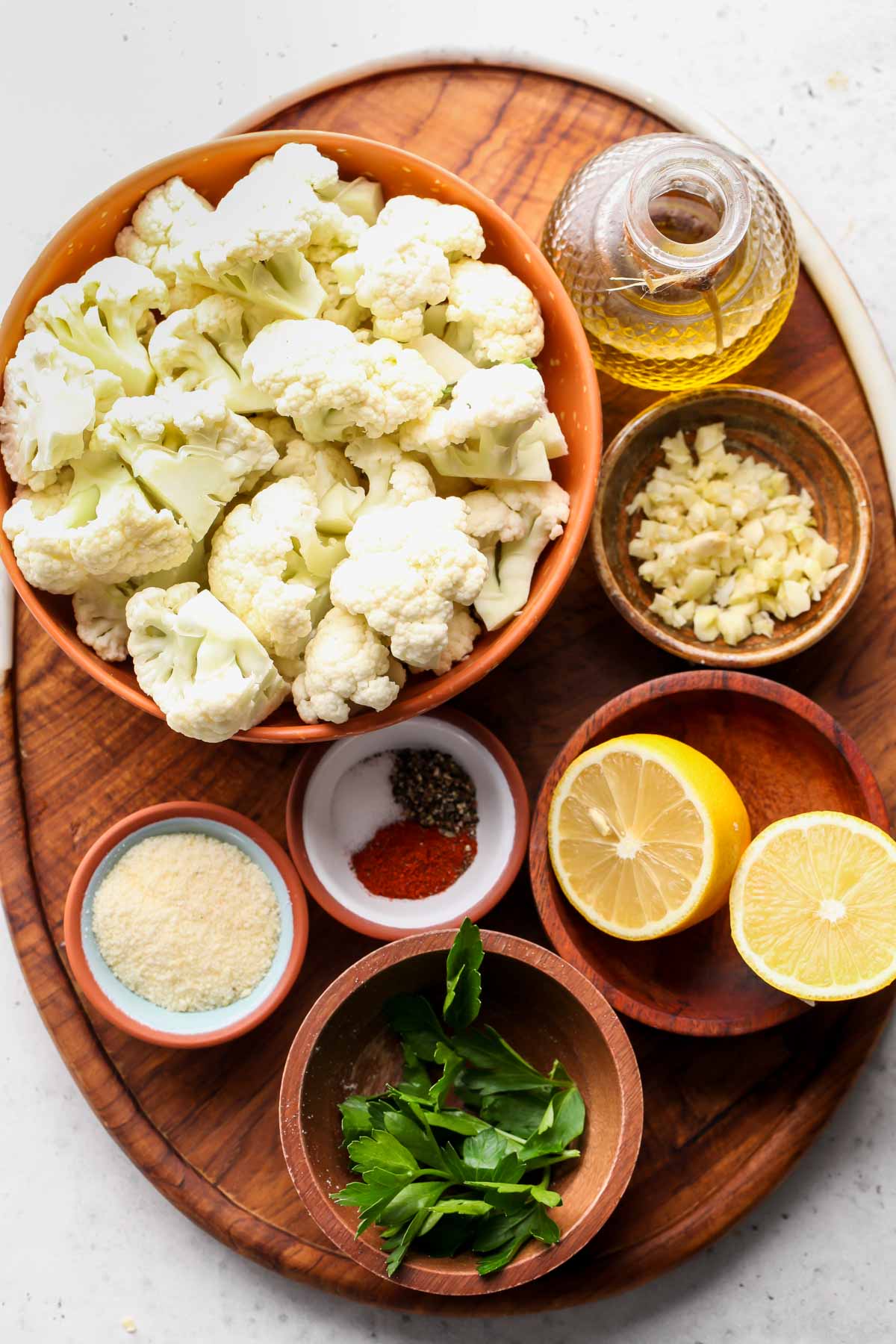 Recipe ingredients arranged on a wooden serving board.