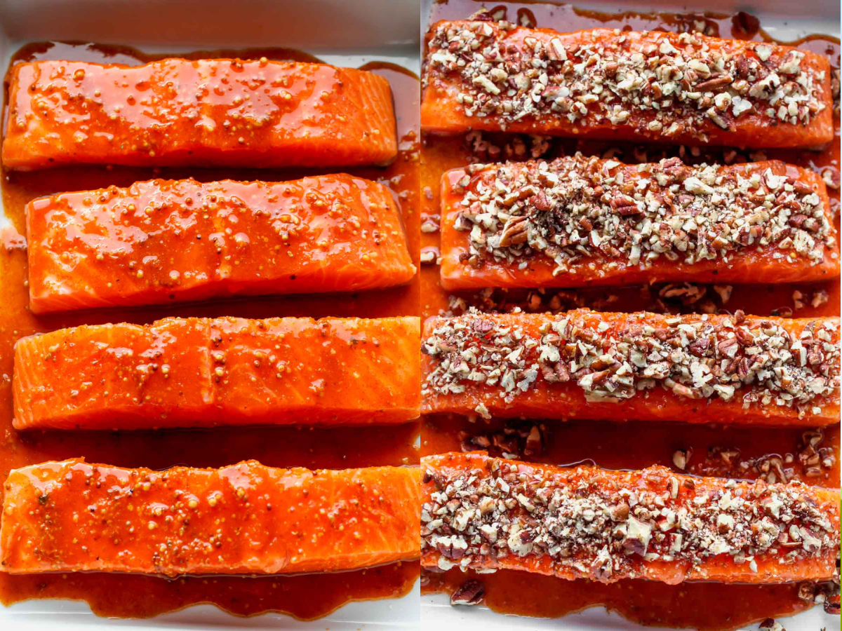 Four fillets of salmon being coated in glaze and topped with crushed pecans
