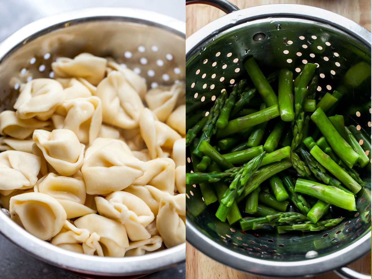 Tortellini and asparagus being cooked and drained in a strainer