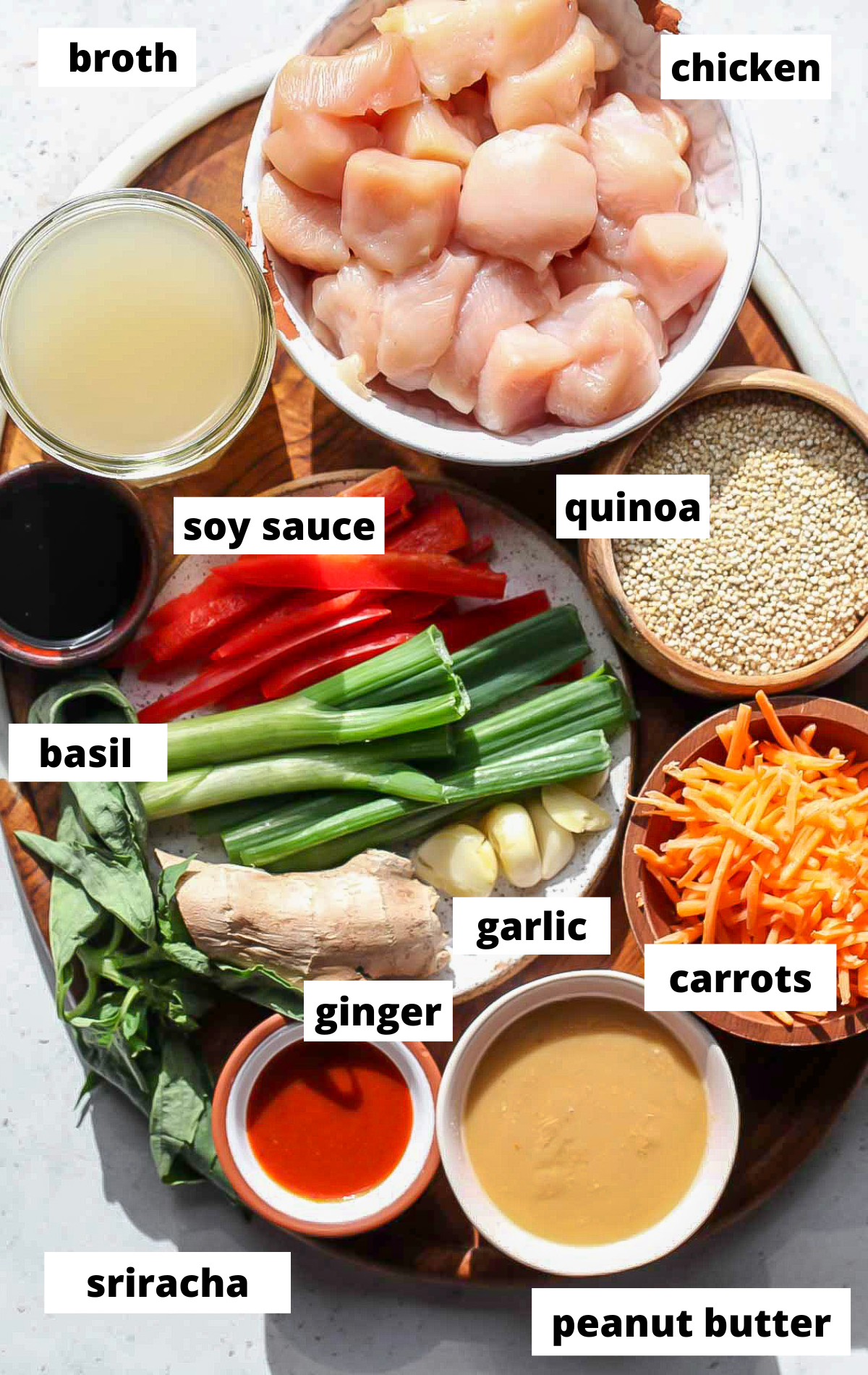 Recipe ingredients with labels arranged on a wooden serving platter