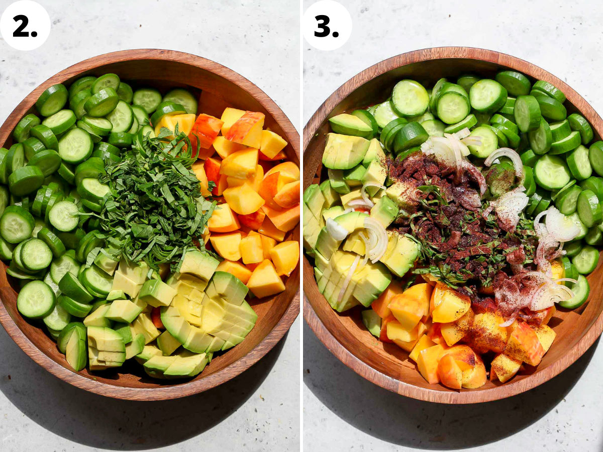 Cucumber, peaches, avocado, herbs, and sumac being combined in a large wooden bowl.