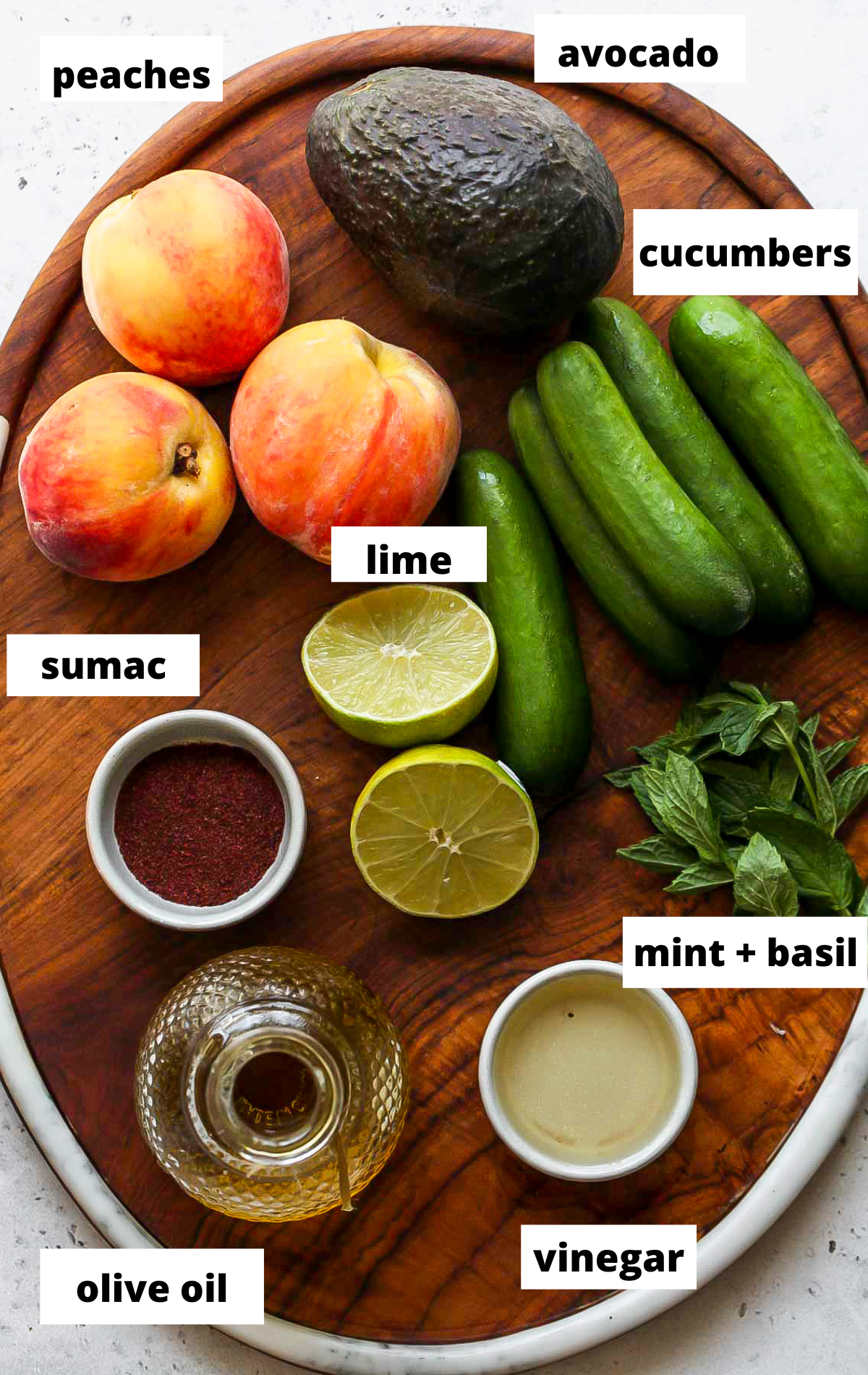 Recipe ingredients on a wooden cutting board with labels.