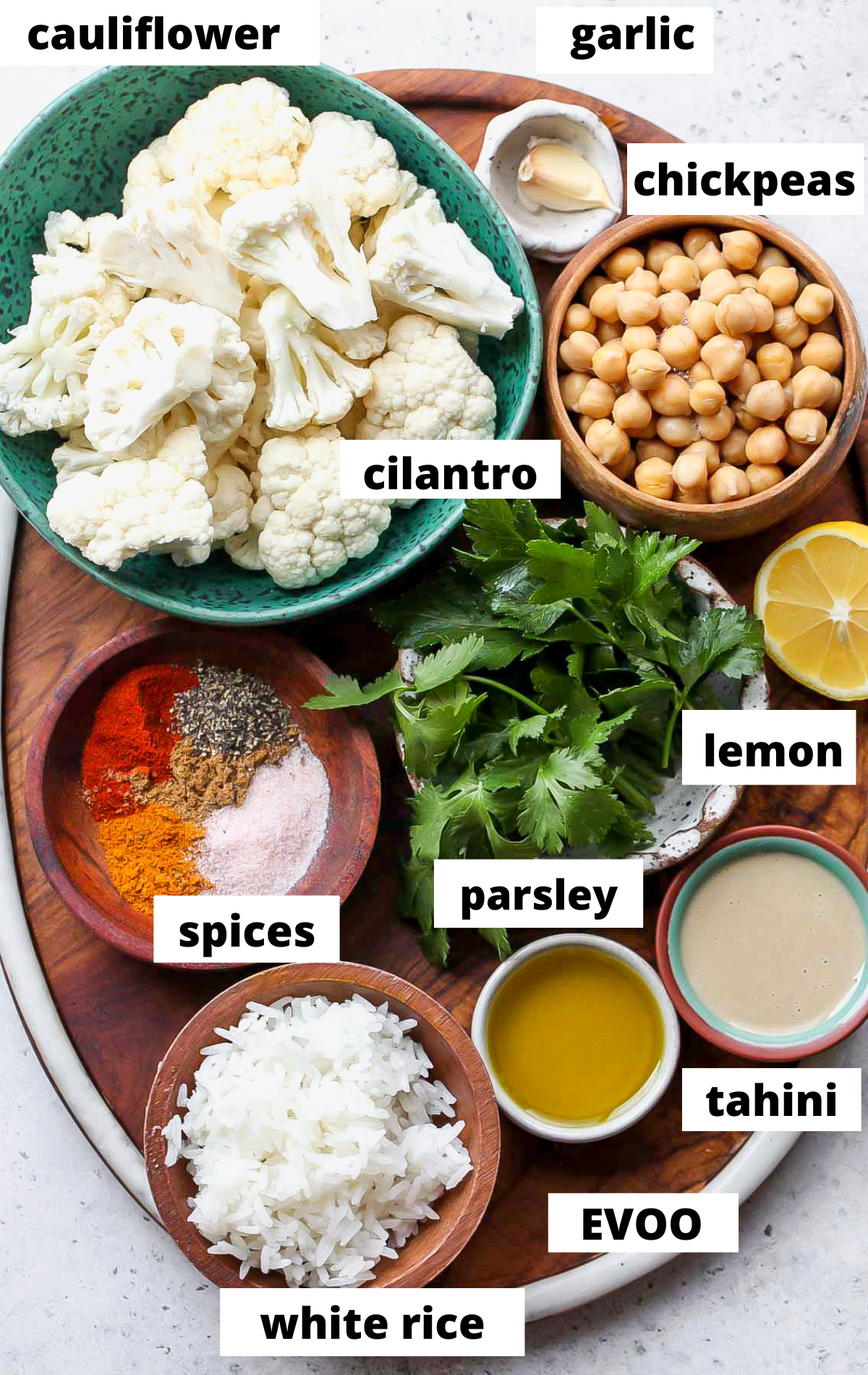 Recipe ingredients in separate bowls with labels.