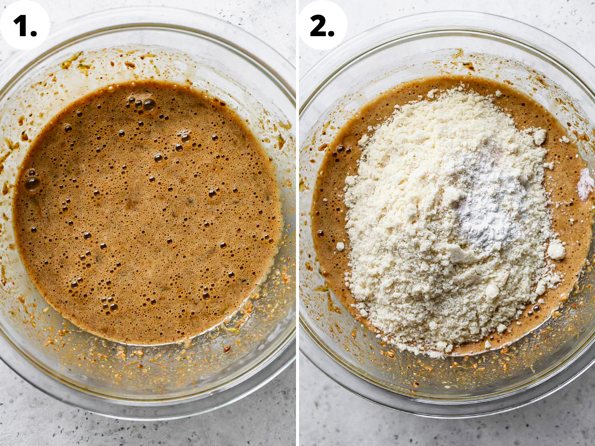 Wet and dry ingredients being combined in a large clear mixing bowl.