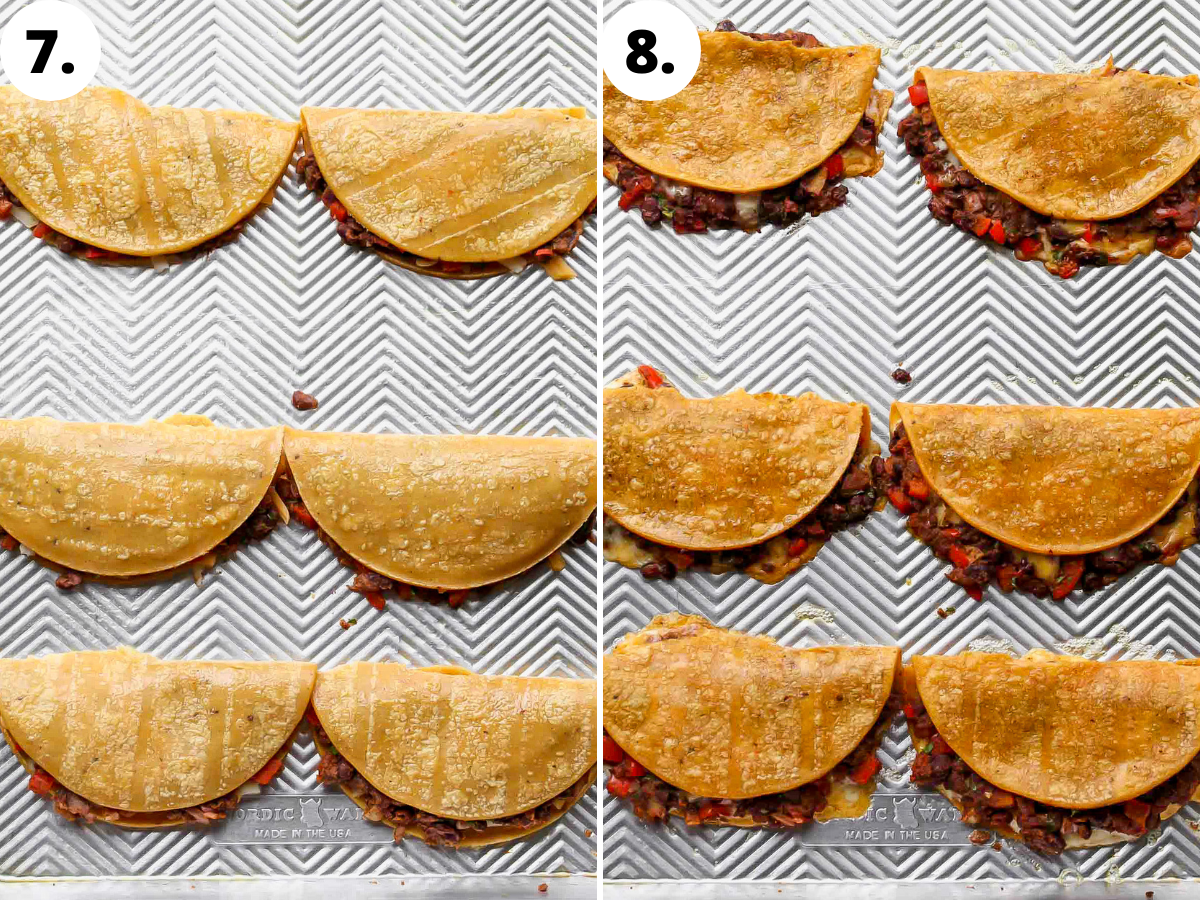Tacos being baked until crispy on a large baking sheet.