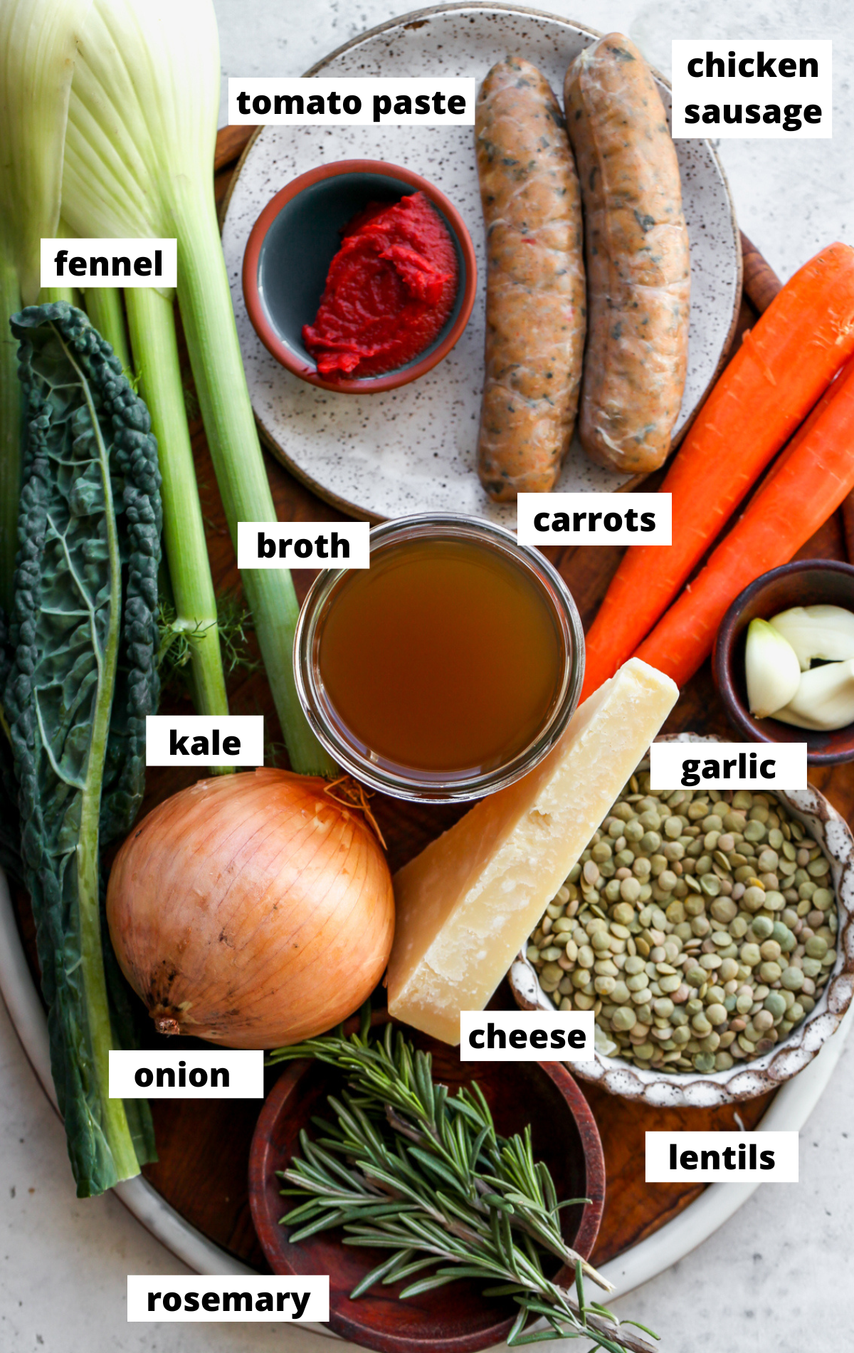 Recipe ingredients in separate bowls arranged on a wooden board.
