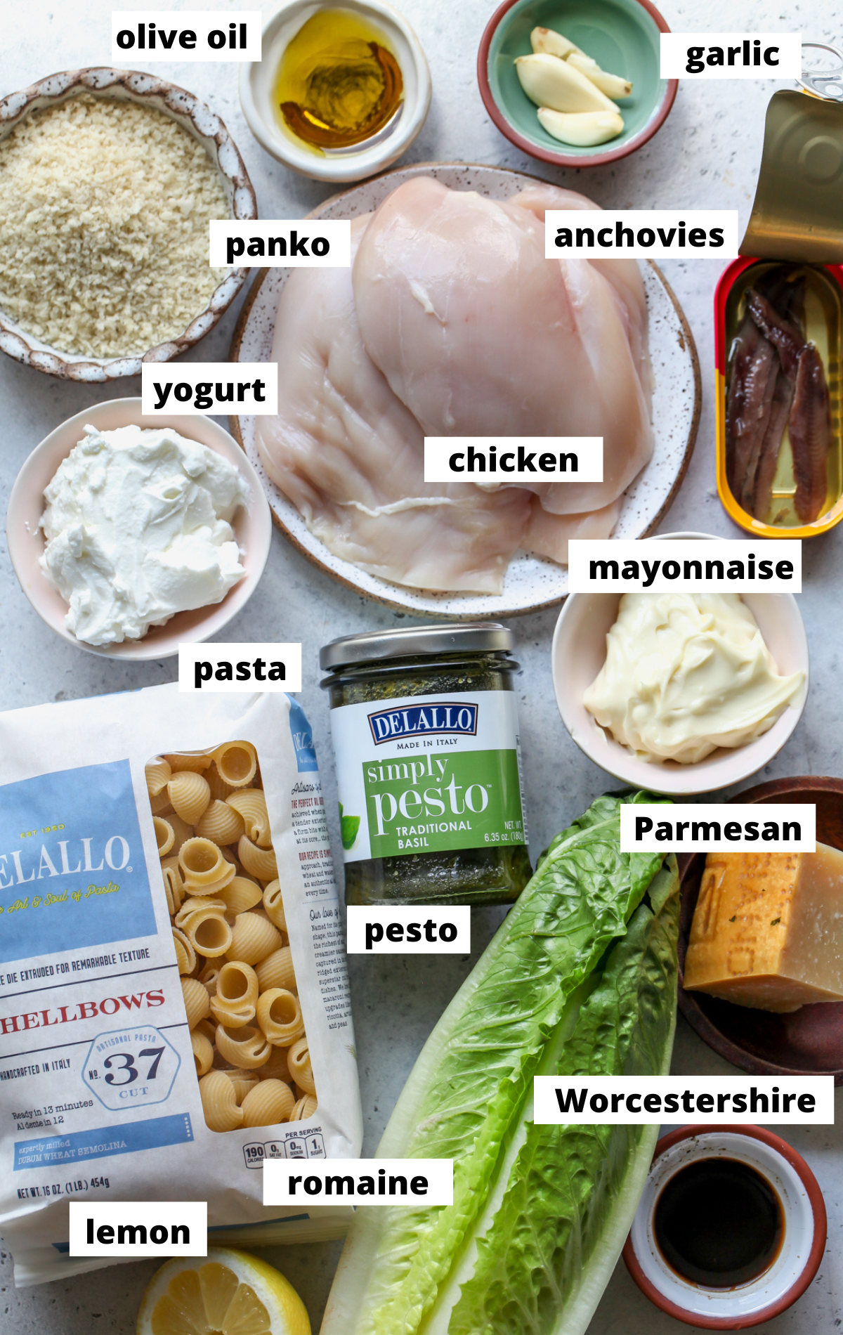 Recipe ingredients arranged on a blue surface with labels.
